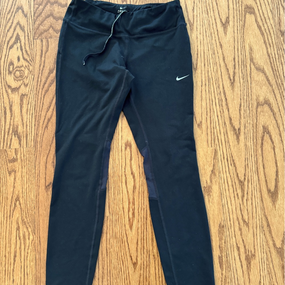Nike women's dry fit tights, size medium. Color black.